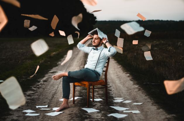 young-man-book-on-head