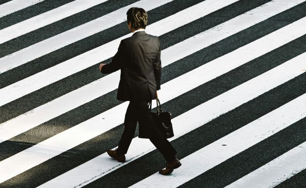 Businessman-Walking-striped-pavement.jp